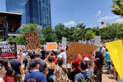 Gun Control Advocates Rally for Action as NRA Convention Proceeds