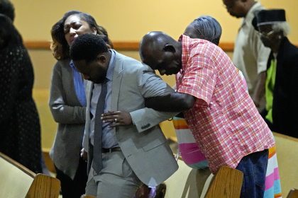 Florida Gov. Ron DeSantis Booed at Vigil as Hundreds Mourn More Racist Killings