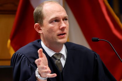 Georgia Judge Dismisses Some Charges Against Trump