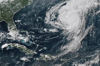 Ernesto Retains Strength as a Hurricane Over the Open Atlantic