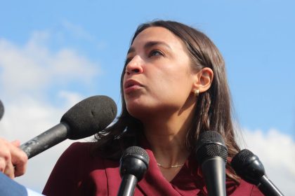 AOC, Sanders Defend FTC Head for Aggressive Antitrust Actions