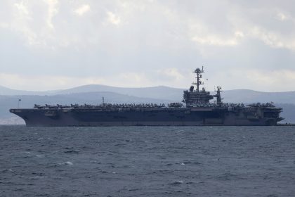 Fighter Jet Slips Off the Hangar Deck of a US Aircraft Carrier in the Red Sea