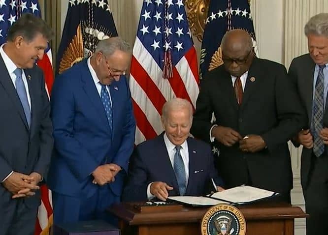 Biden Signs Inflation Reduction Act in Modest White House Ceremony