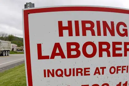 US Jobless Claims Fall to 406,000, a New Pandemic Low