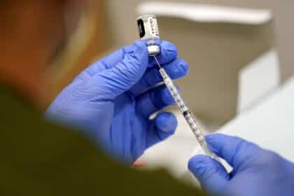 Businesses Nervously Await Fine Print of Vax-or-Test Rule