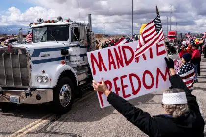 <strong></img>Truck Convoys Head to Washington to Protest Pandemic Restrictions</strong>