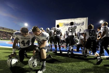 AP-NORC Poll: On Game Day, Some See Prayer as a Hail Mary